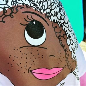 Ladies New White Graphic Tee, Curly Hair.